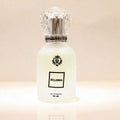 Perfume bottle with a crystal cap on a beige background